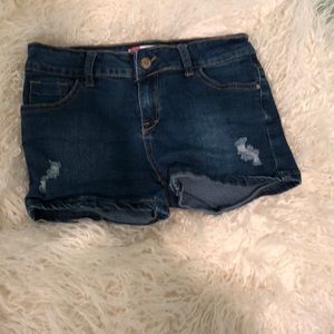 Small blue denim jean with rips